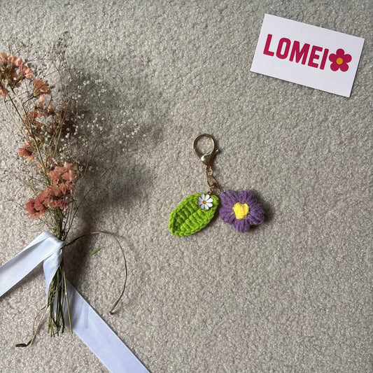 Crochet - Fleur violette avec feuille