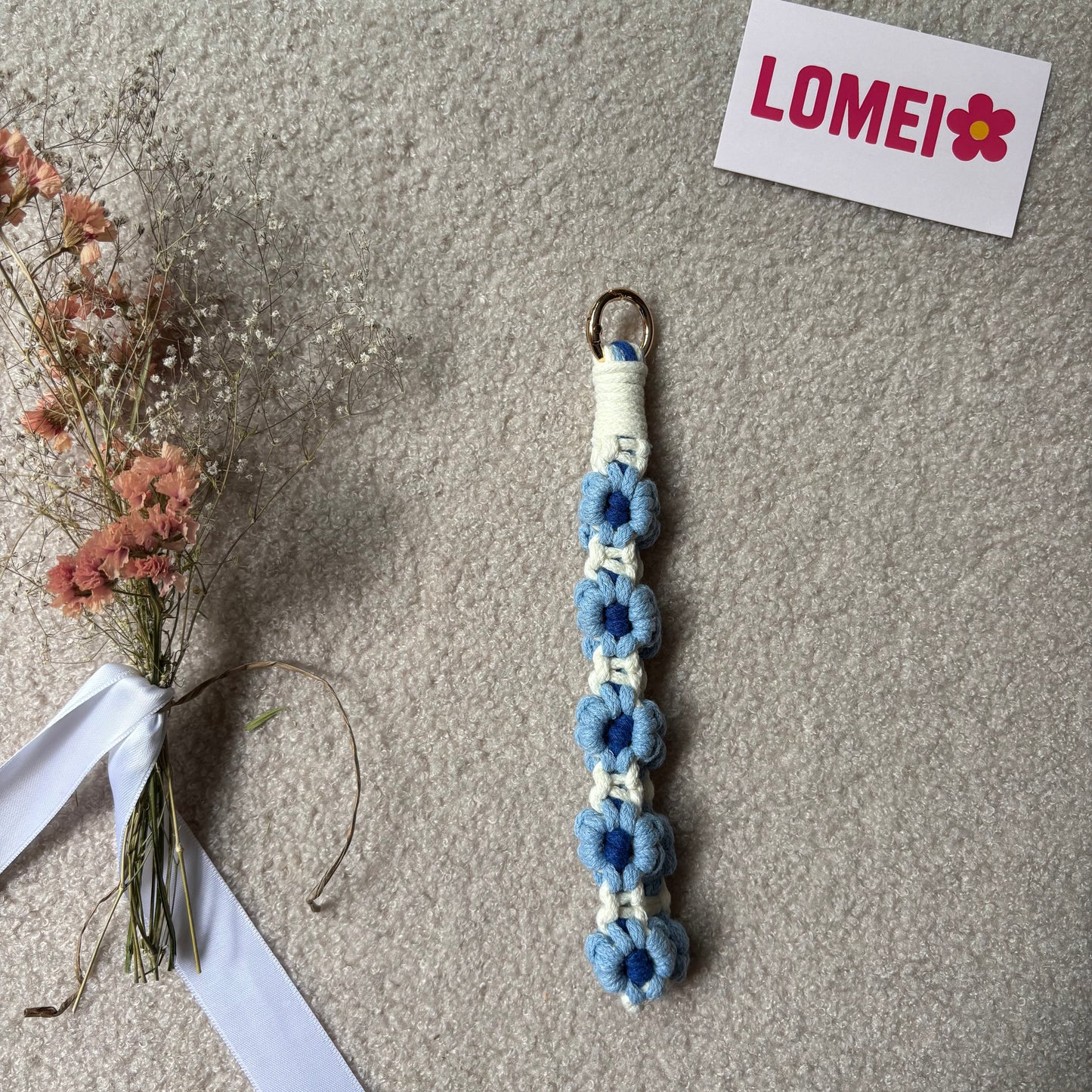 Breloque à fleurs bleues